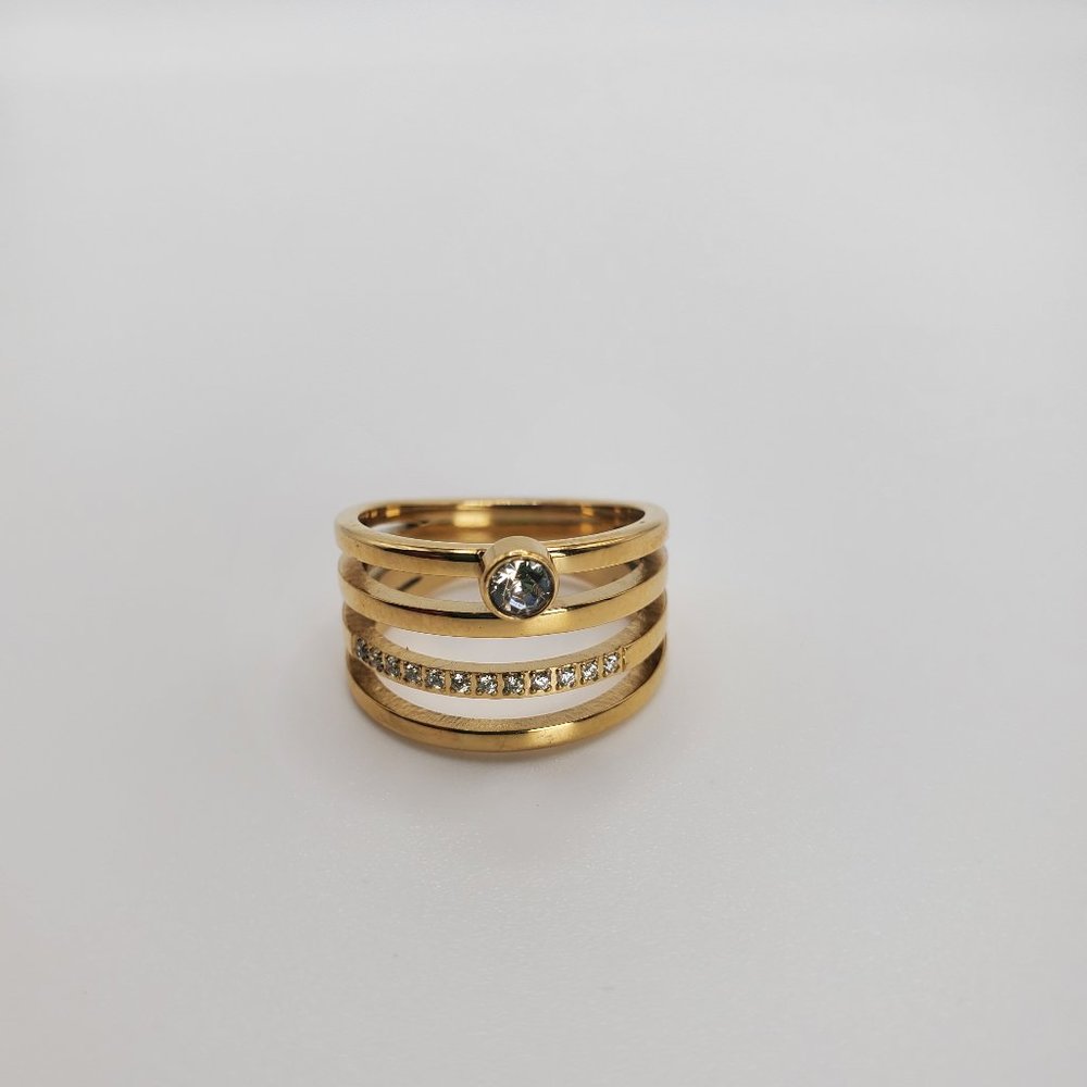 Ring for women new with tags , stainless steel , color gold , size 6,7,8 &9